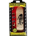 close up fingerboard skull hand (wood)